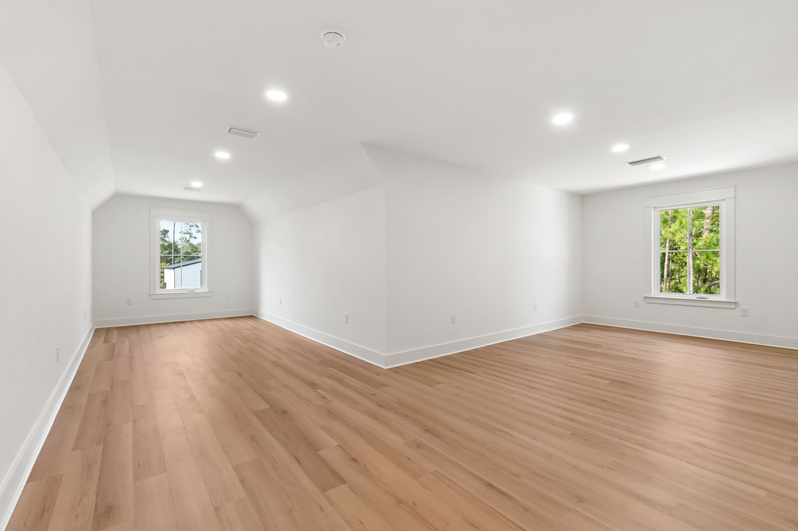 Bonus room with natural light in an AJAC Group custom home
