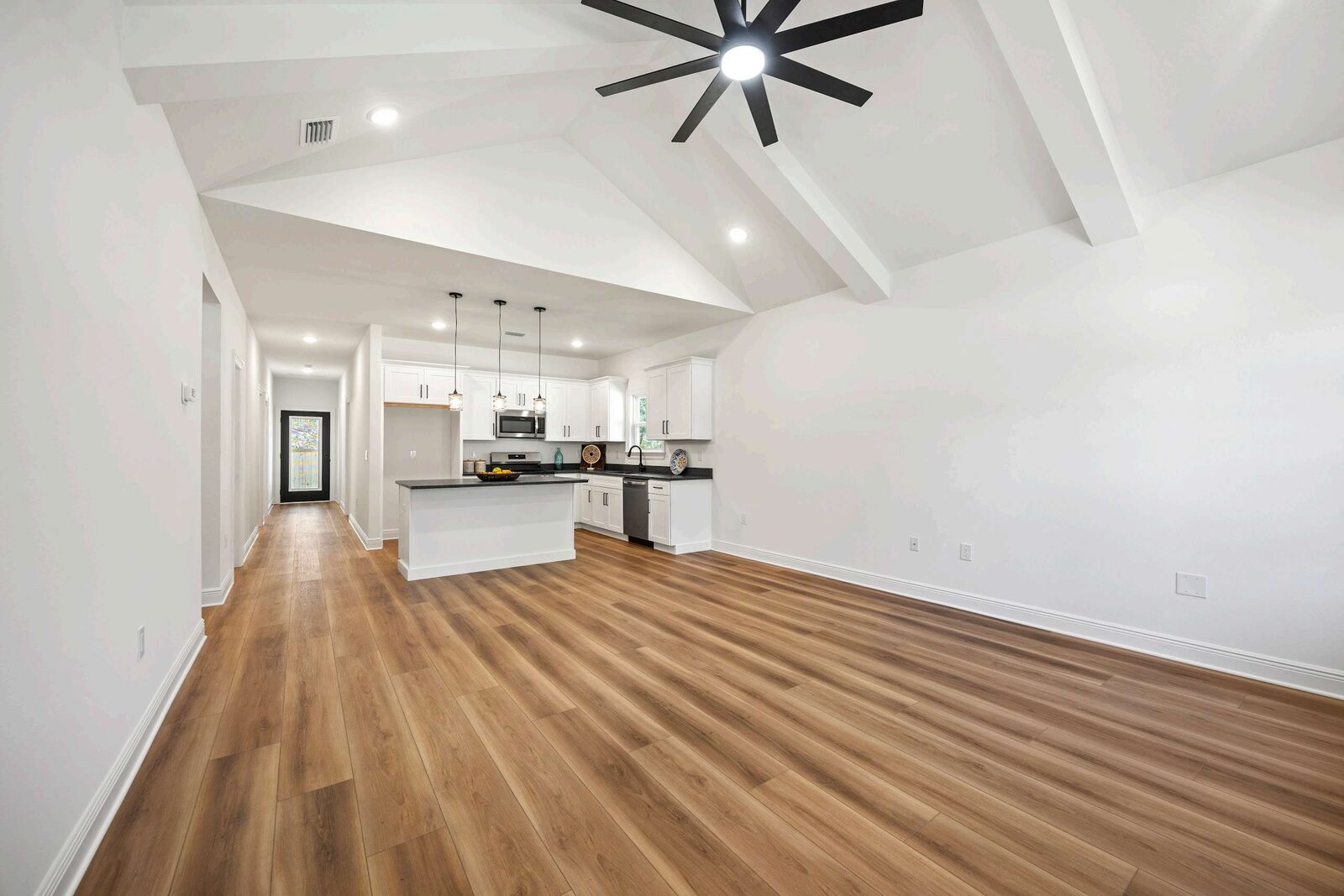 Vaulted ceiling great room in an AJAC Group new construction home